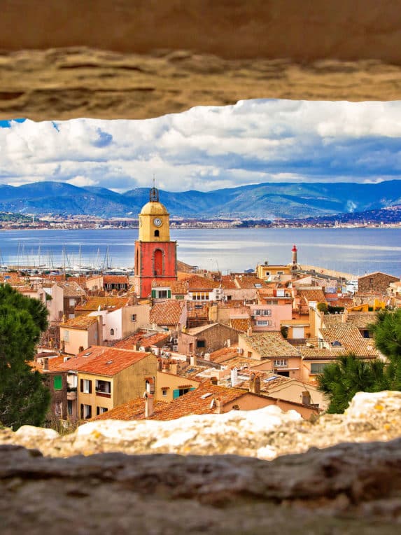 Saint Tropez village church tower and old rooftops view through